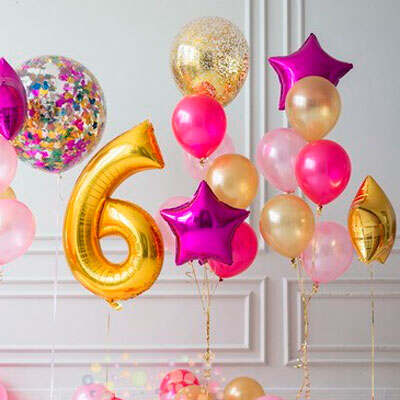 Colourful helium balloon bouquet for birthdays and celebrations in London
